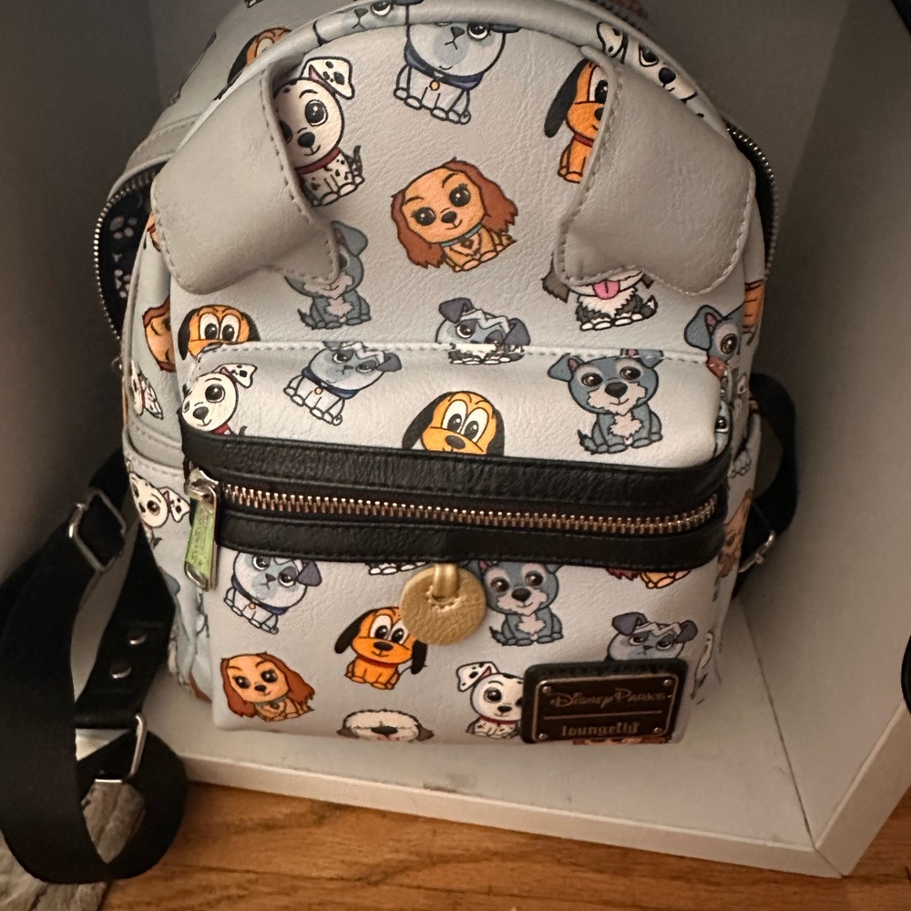 Disney Loungefly Dog Print Mini Backpack      PRICE IS FIRM